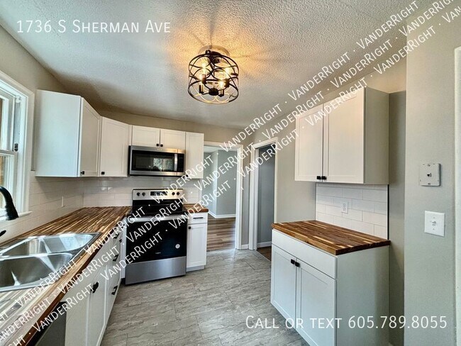 Building Photo - 1736 S Sherman Ave
