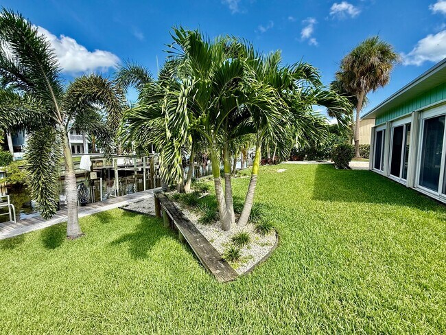 Building Photo - Palm City Home with Dock and Lift