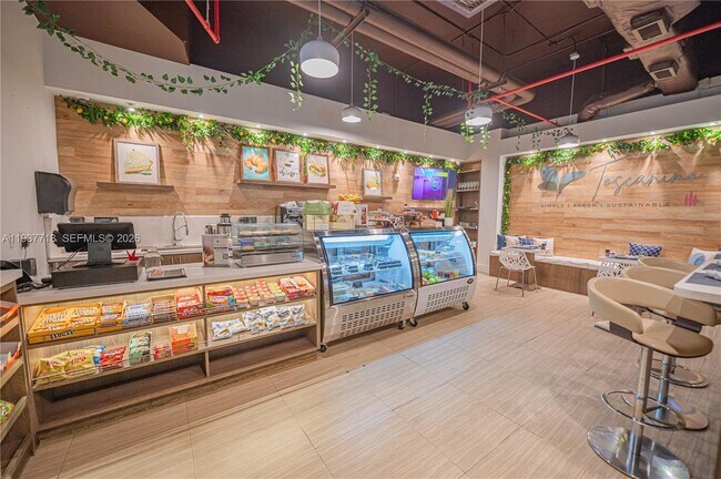 Building Photo - 10275 Collins Ave