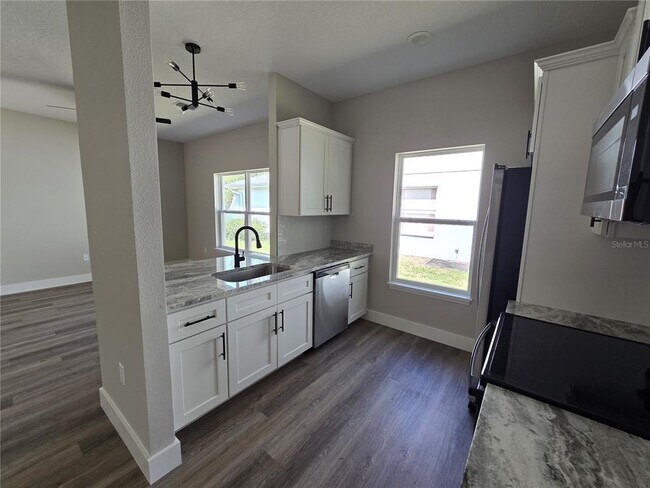Building Photo - 7435 Mead Dr