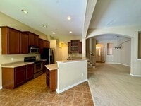 Building Photo - Upscale 3BR Vineyard Square Townhome | Gourmet Kitchen & Two-Car Garage