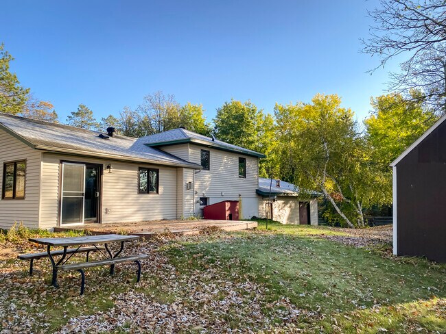 Backyard with deck - 1606 S Lake Irving Dr SW