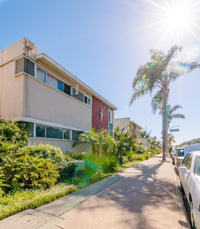 Building Photo - Welcome home to Seabreeze Garden Apartments