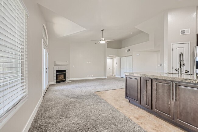 Building Photo - Discover this spacious and well-appointed 2-bedroom + office/den, 2-bath condo located in the hig...