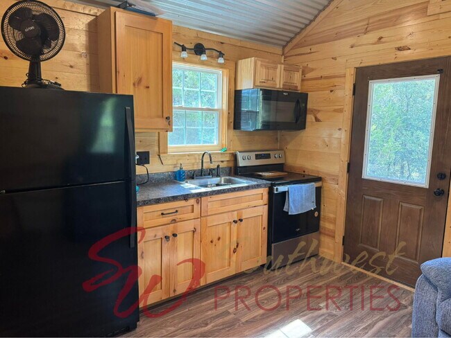 Building Photo - Escape to a peaceful, private retreat for one in this studio cabin!