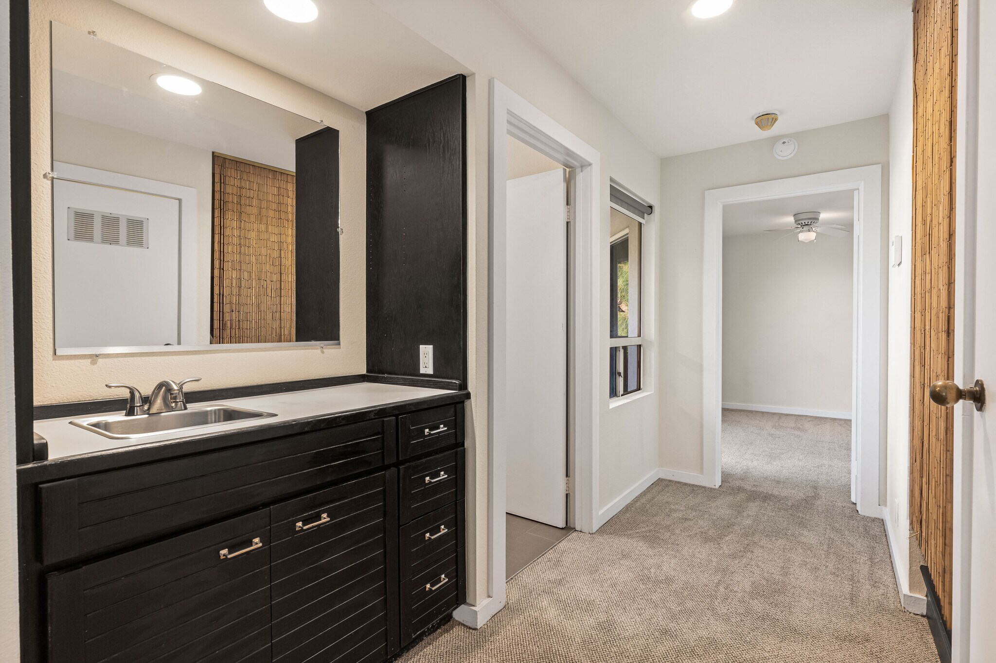Hallway to bath and bedroom with wet bar - 1759 Silverwood Ter