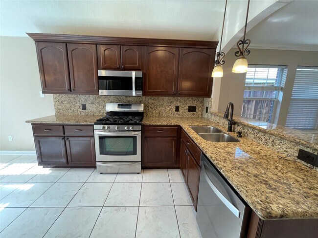 Building Photo - 9715 Raul Hector Dr