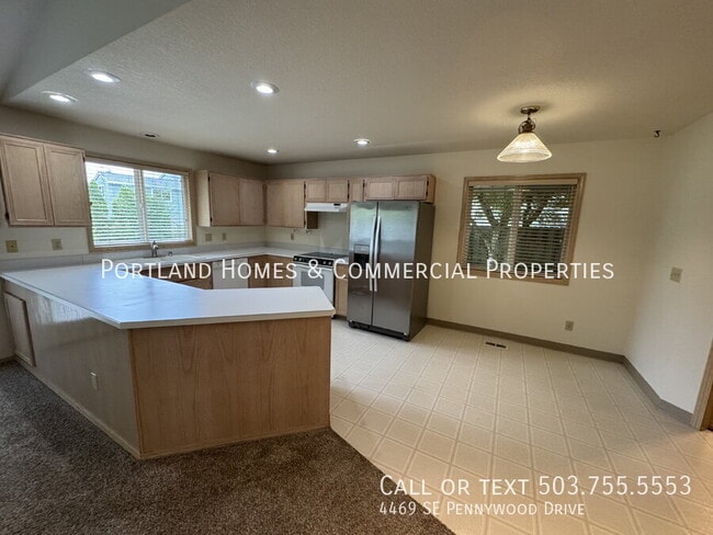 Building Photo - 4469 SE Pennywood Dr