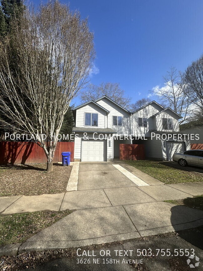 Building Photo - NE Duplex with Fenced Backyard