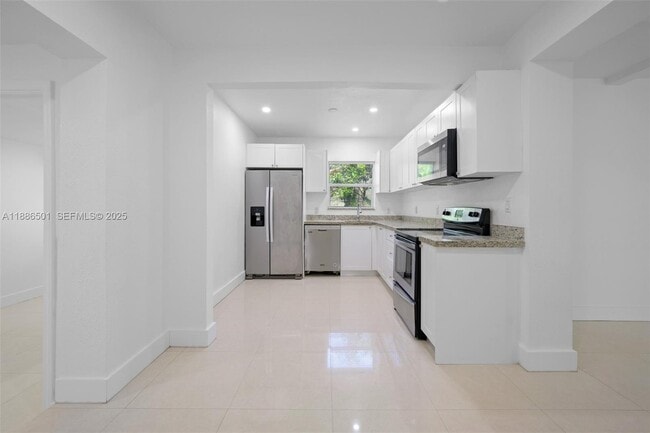 Building Photo - 9312 NW 3rd Ave