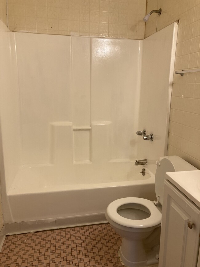 Bathroom with shower & tub - 8805 Tyrell Dr