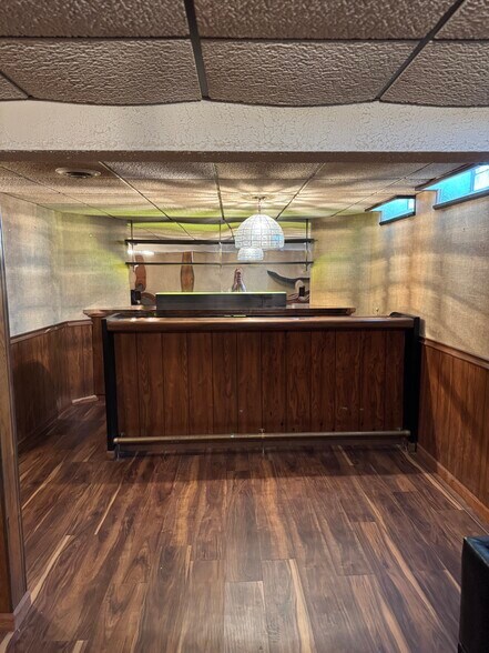 Finished basement bar - 15183 Raphael Ter