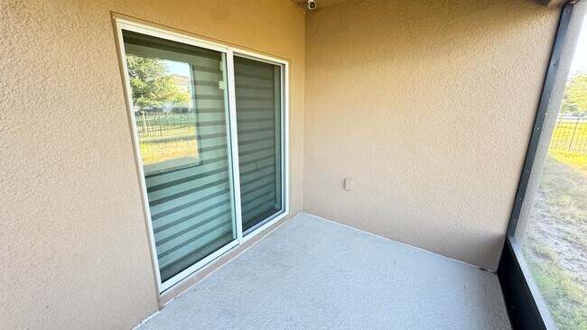 Building Photo - Available NOW! Spacious 4BD/2BA Haven in Villages at Harmony – Your Dream Home Awaits! WASHER & D...