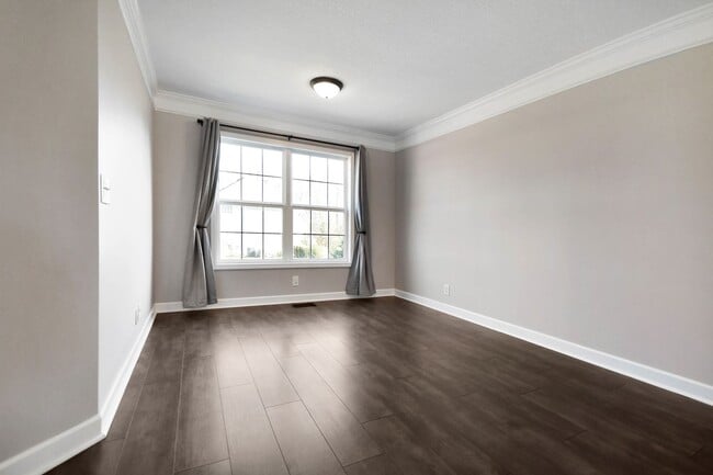 Building Photo - Pet Friendly Three Bedroom with Bonus!