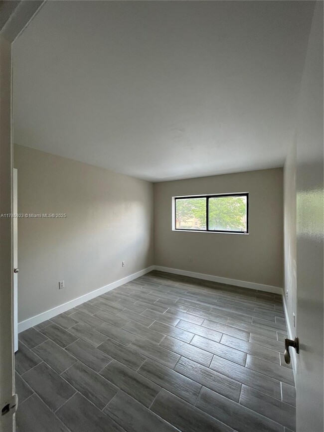 Building Photo - 7427 SW 152nd Ave