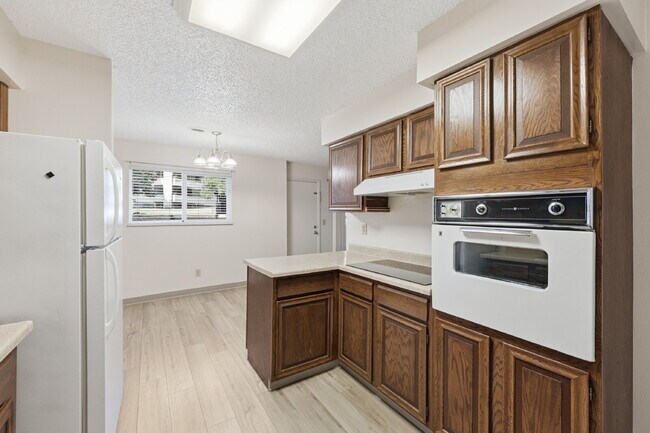Building Photo - $1,345.95, 2-bed, 2-bath condo located in Colorado Springs with in-unit laundry and $300 cleaning...