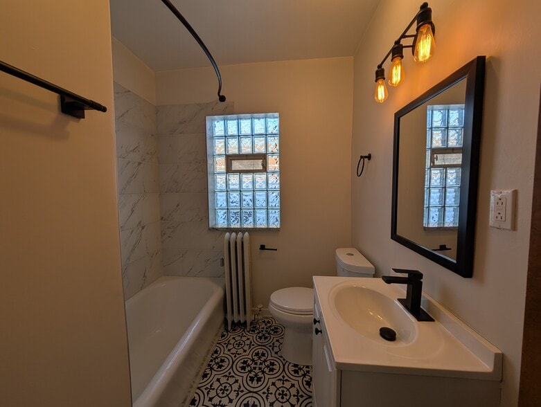 Building Photo - 5817 W Berteau Ave