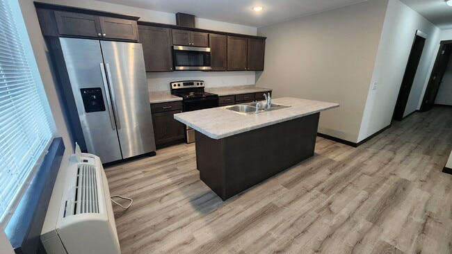 Building Photo - Available April 1st - Modern 2 Bedroom, 2 Full Bathroom with Garage