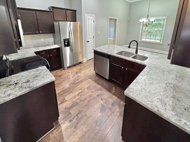 Building Photo - OPEN HOUSE! Now Leasing A Spacious 4 Bedro...