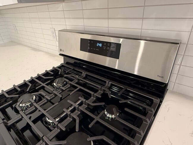 Building Photo - Half off first months rent - Beautiful townhome, construction just completed, 2 car garage, centr...