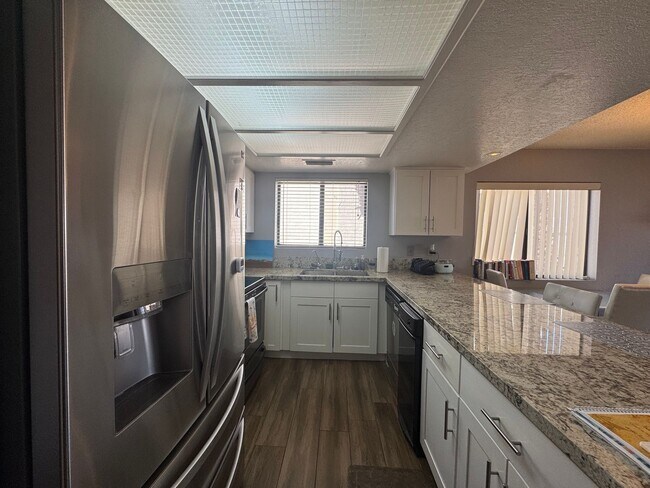 Building Photo - FURNISHED 2BR CONDO w/Utilities Water View Gated NO STAIRS