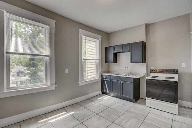 Building Photo - 1214 Iliff Ave