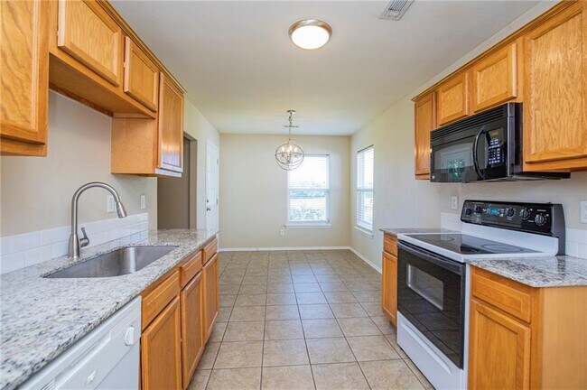 Building Photo - 6405 SW Meadow Well Ave