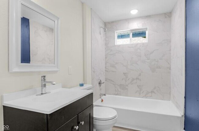 Building Photo - "Charming 3-Bed Duplex with Modern Comforts at 2235 MLK Jr Street, Indianapolis!"