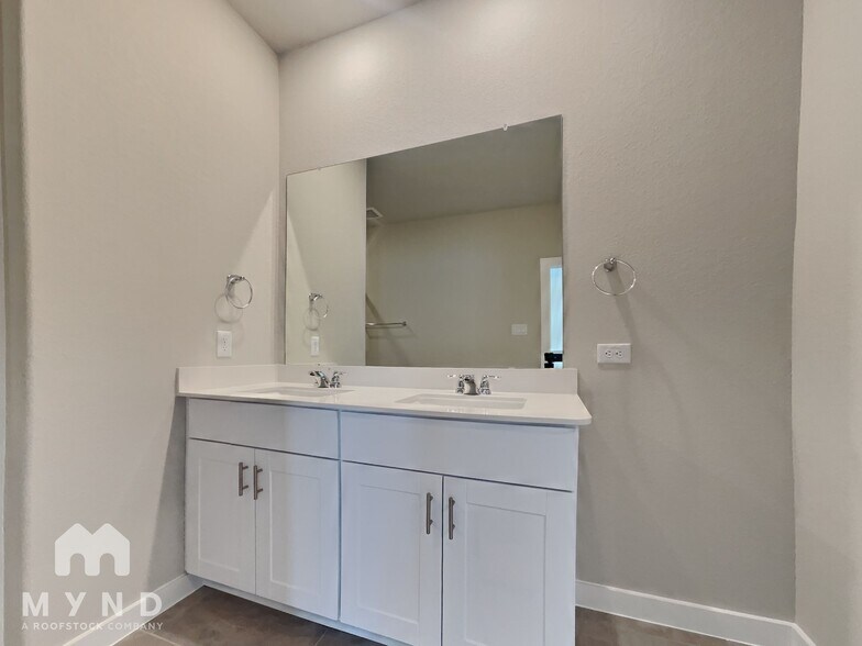 Building Photo - 8117 Rising Stream Dr