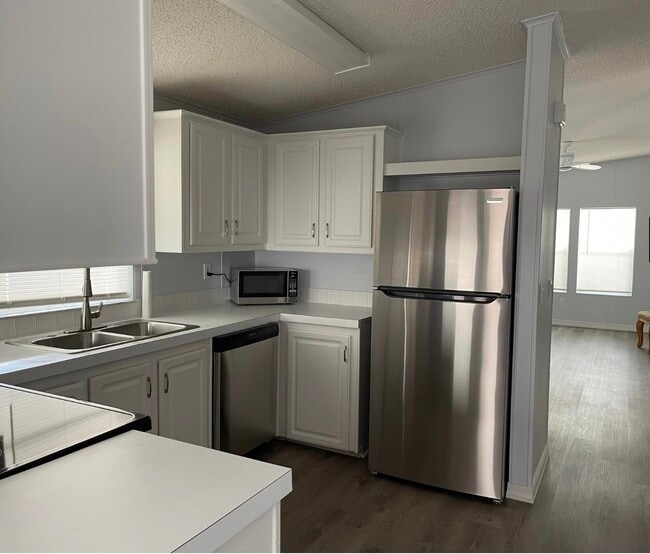 Building Photo - 8179 Sandwedge Terrace