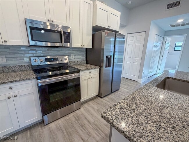 Building Photo - 3716 SW 16th Pl