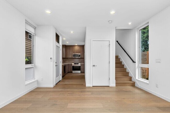 Building Photo - Hilltop Gem w/ AC and 360° Rooftop Views (1st Month Free)