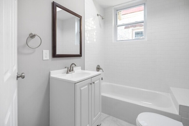 Building Photo - Renovated 4-Bedroom Home with Modern Finishes