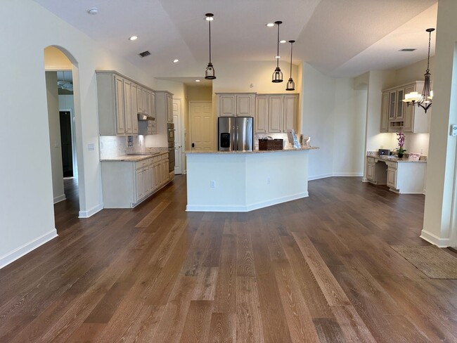 Building Photo - Luxurious 4 Bedroom 3 Bath Lakefront Pool Home W/3-Car Garage