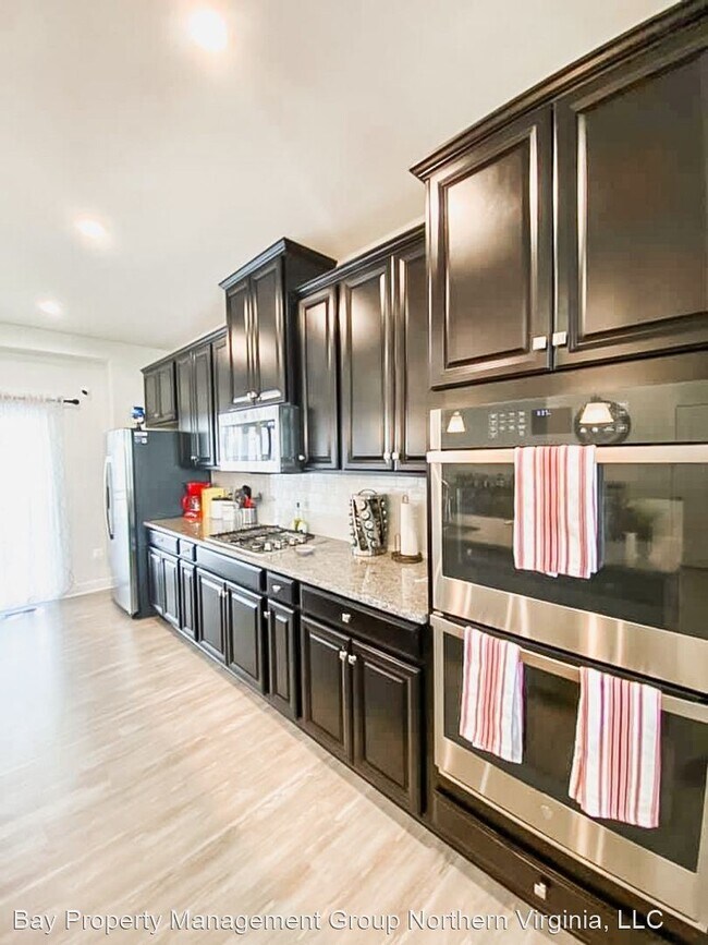 Building Photo - 4 br, 3.5 bath House - 7751 Blackburn Ridg...
