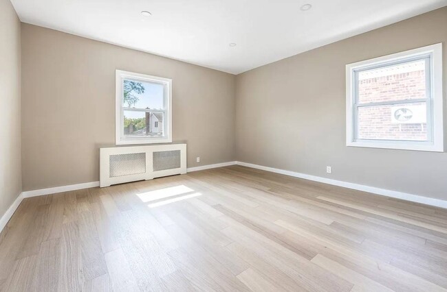 Building Photo - 208-12 53rd Ave