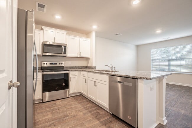 Building Photo - End unit! Available Early June!