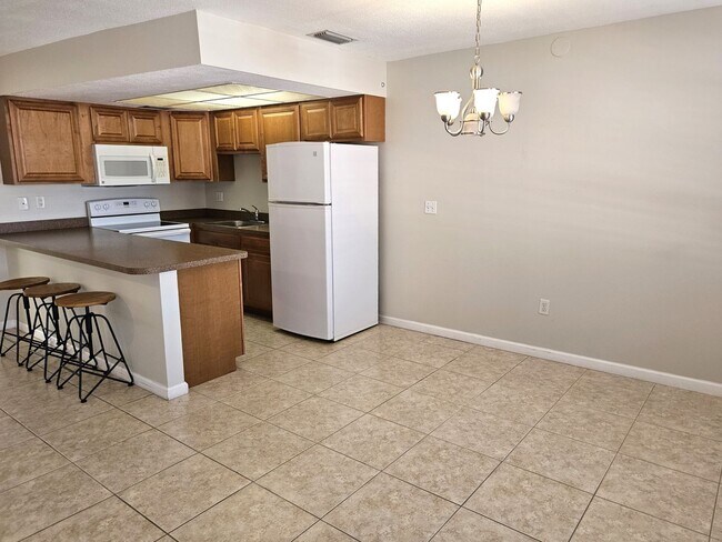 Building Photo - Annual 2nd Floor Condo For Rent located on...