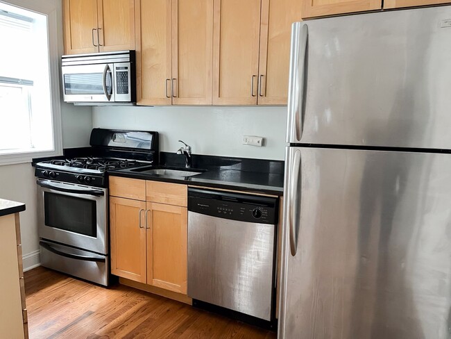 Building Photo - Uptown - 2 Bed / 2 Bath - Central Heat & AC