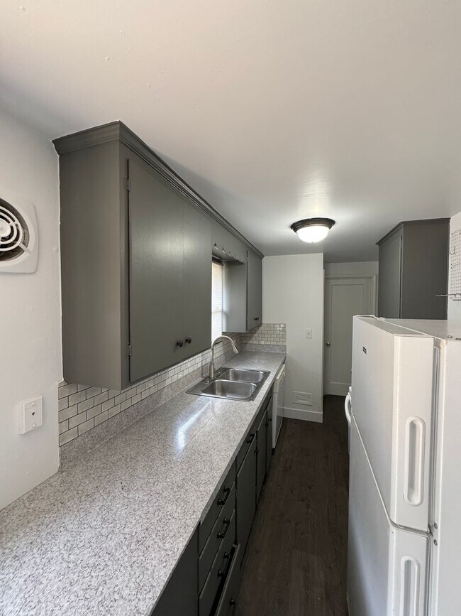 Building Photo - Spacious Two Story (2BR/1BA) Home with Large Fenced-In Yard