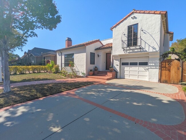 Building Photo - Spanish-Style Home on Treelined Street in ...