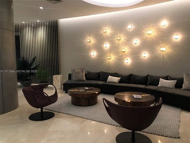 Building Photo - 10275 Collins Ave