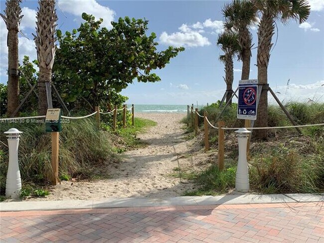 Building Photo - 6039 Collins Ave