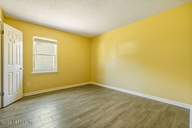 Building Photo - 8066 Le Havre Dr N