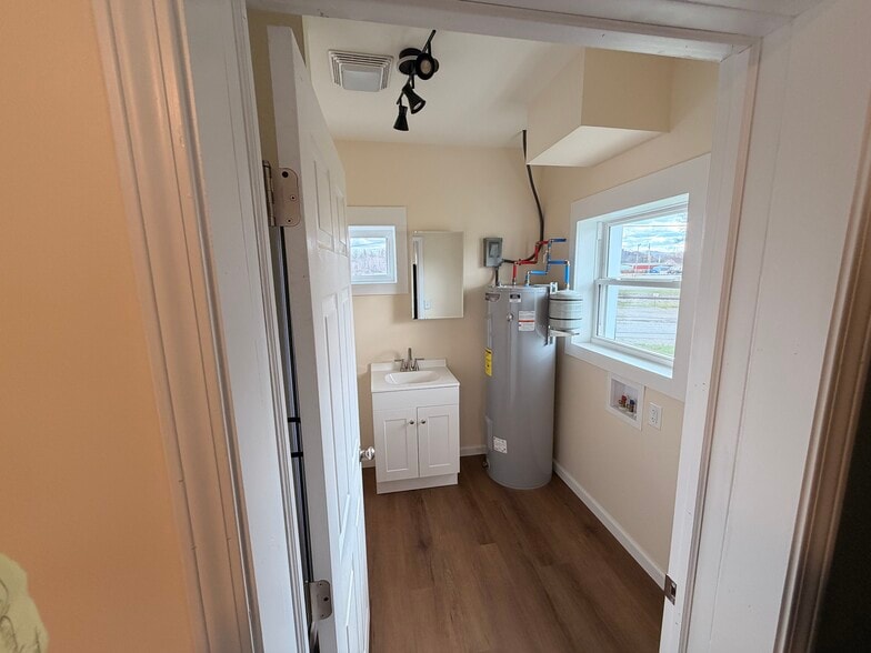 Bathroom and laundry off kitchen - 214 Perry St