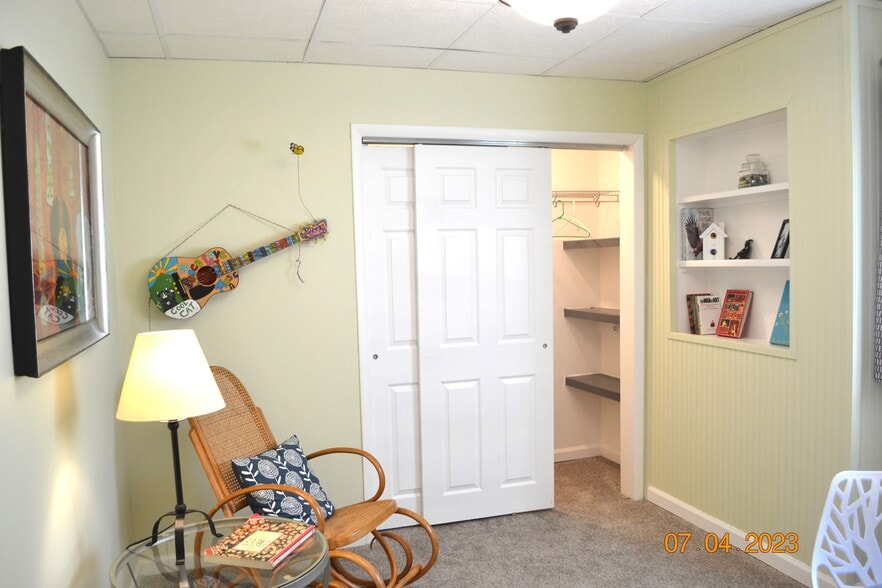 downstairs bedroom/den has a large closet - 222 W Peck St