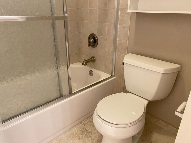 Building Photo - Remodeled 2 Bedroom 2 Bath Condo in Park-like Cedar Gables Community!