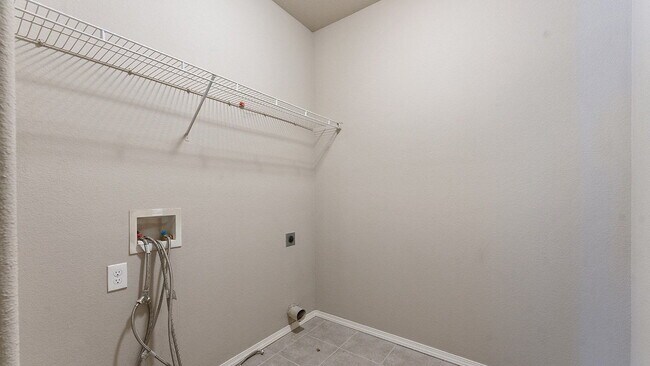 Building Photo - Spacious 4-Bedroom with Elegant Granite Finishes