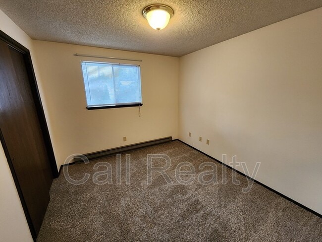 Building Photo - 10811 E 26th Ave