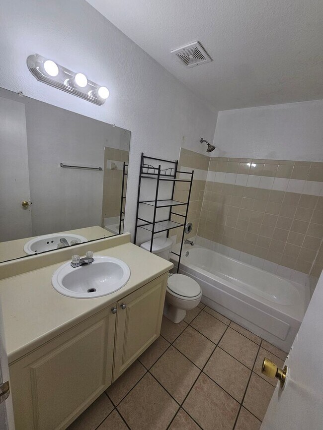 Building Photo - NICE!  2 BED / 2 BATH CONDO (ACROSS FROM C...